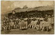 Ansichtspostkarte; Kolonialpost, Kamerun, Gruppenaufnahme von Mitgliedern des Josephsvereins vor der Jaunde in Jaunde/Kamerun, Deutsch-Westafrika, gelaufen