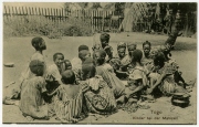 Ansichtspostkarte; Kolonialpost, Drucksache, Rücksendung, "Togo. Kinder bei der Mahlzeit", Weihnachts- und Neujahrsgruß der Missionare, Missionsschwestern und Christen der Katholischen Mission in Togo, gelaufen